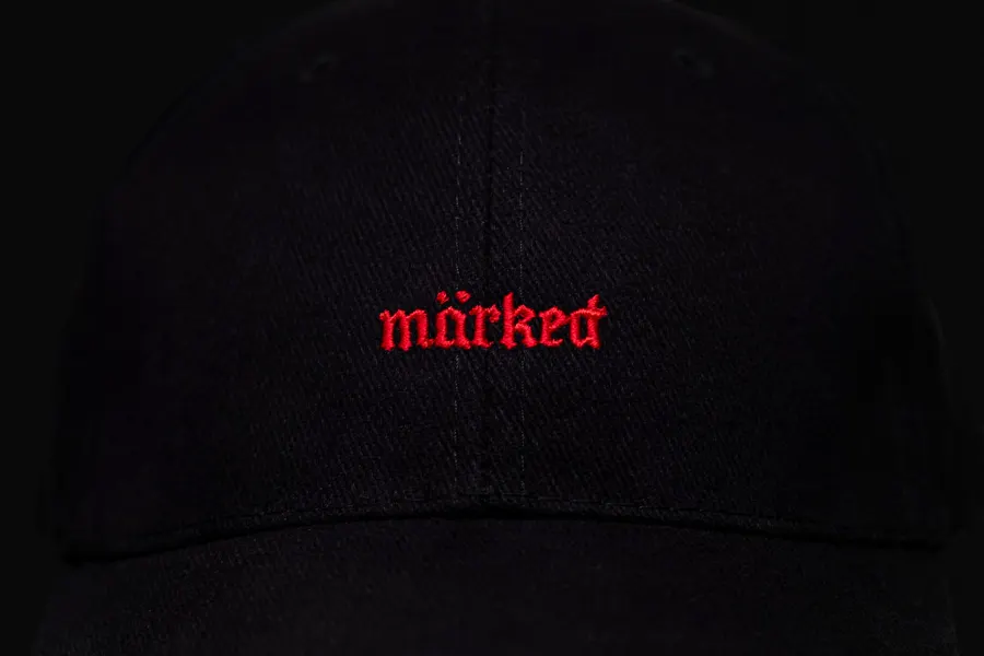 Märked cap, embroidery detail